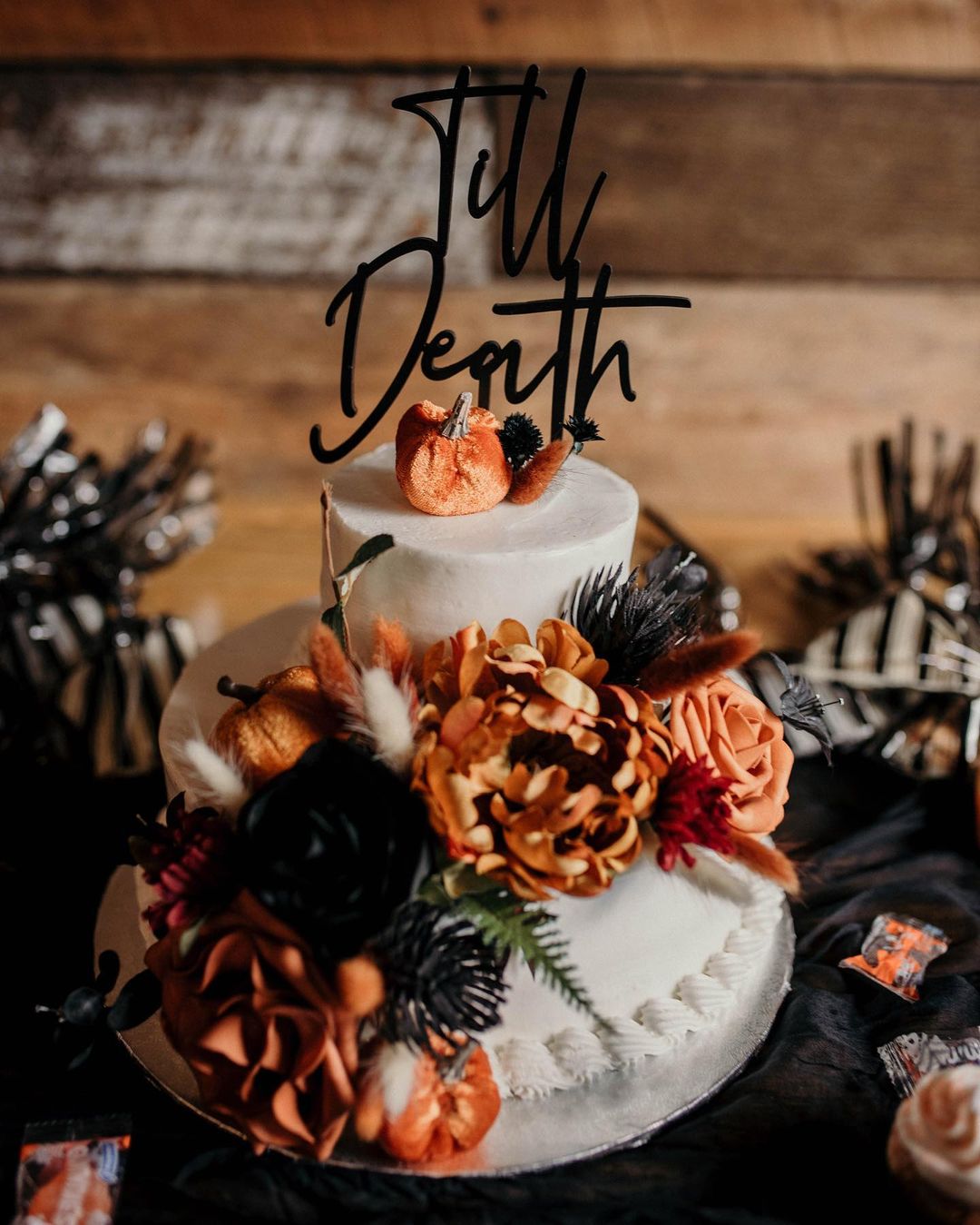 fall gothic rustic wedding cake with terracotta flowers via ttrickorrtreatt