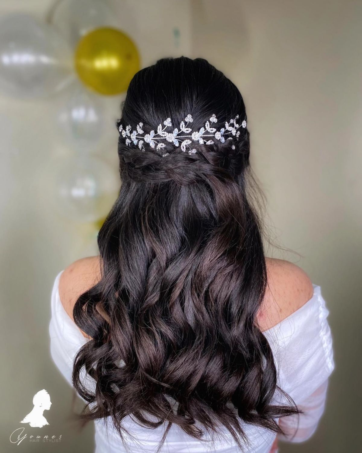 long wavy half up quinceanera hairstyle down with hairpiece