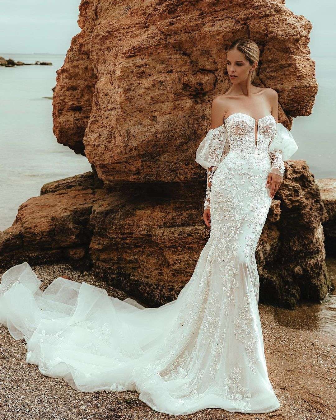 off the shoulder lace fit and flare bridal gown with puff sleeves via royaldiofficial