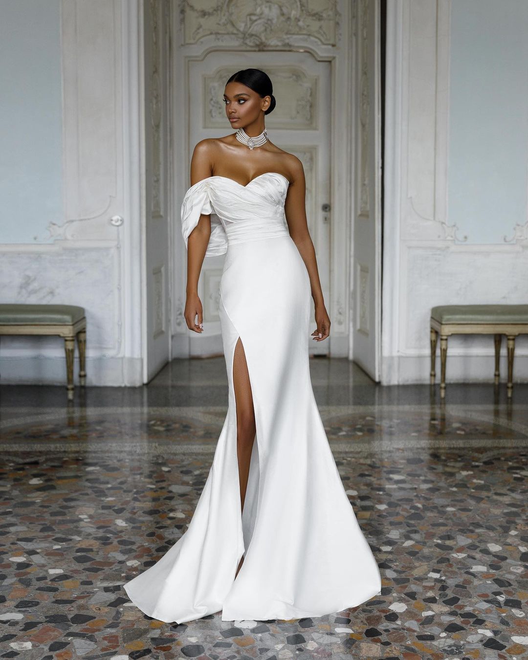 one shoulder satin fit and flare wedding dress with high slit