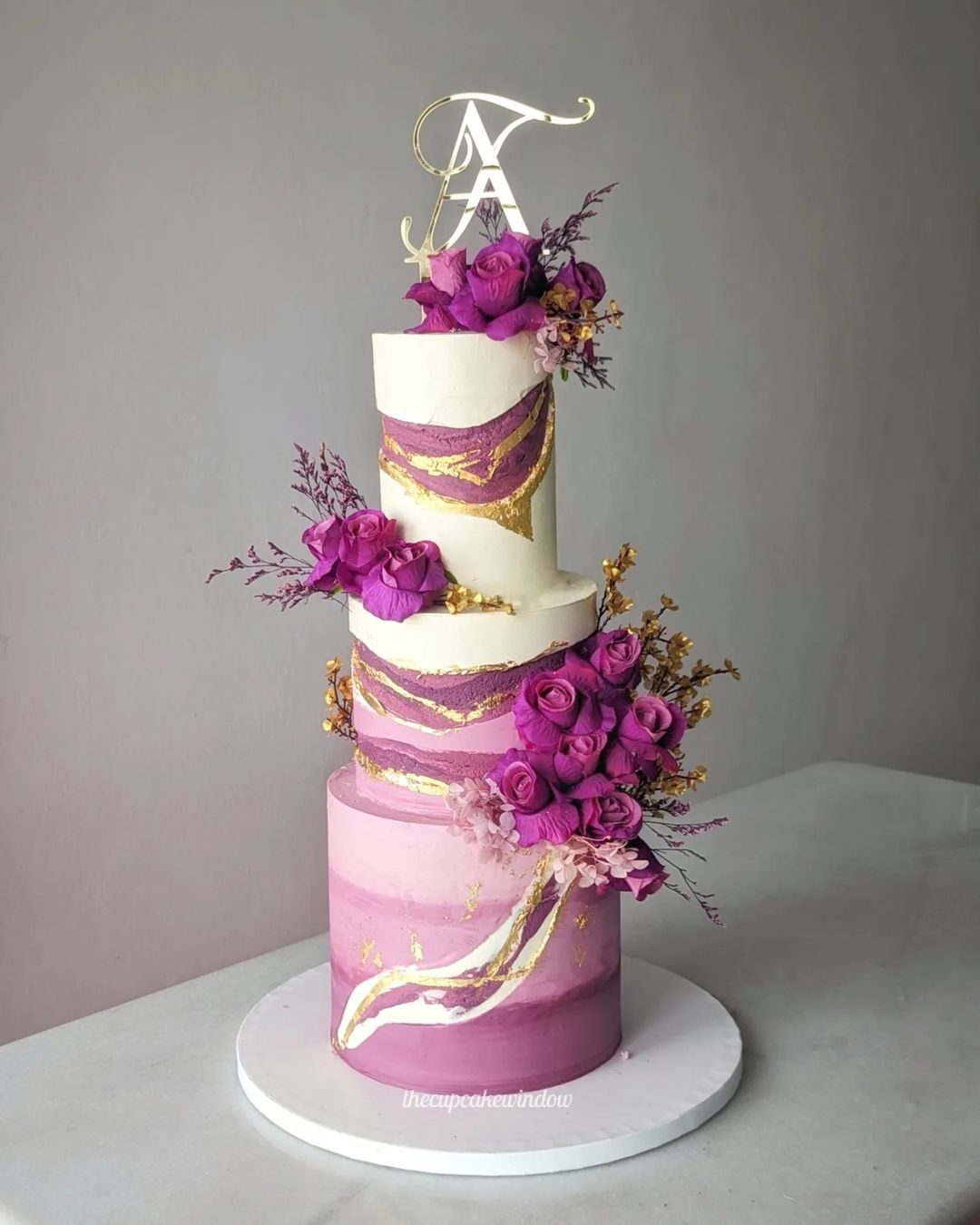 purple marble and gold 3 tier wedding cake via thecupcakewindow