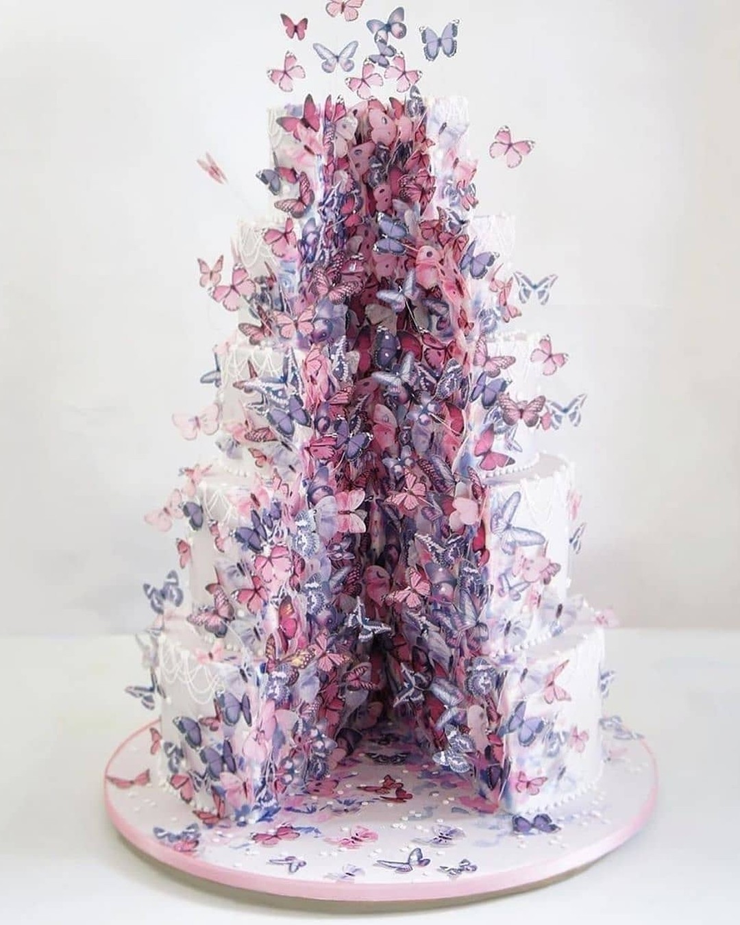 romantic vintage purple butterfly wedding cake via stylemepretty
