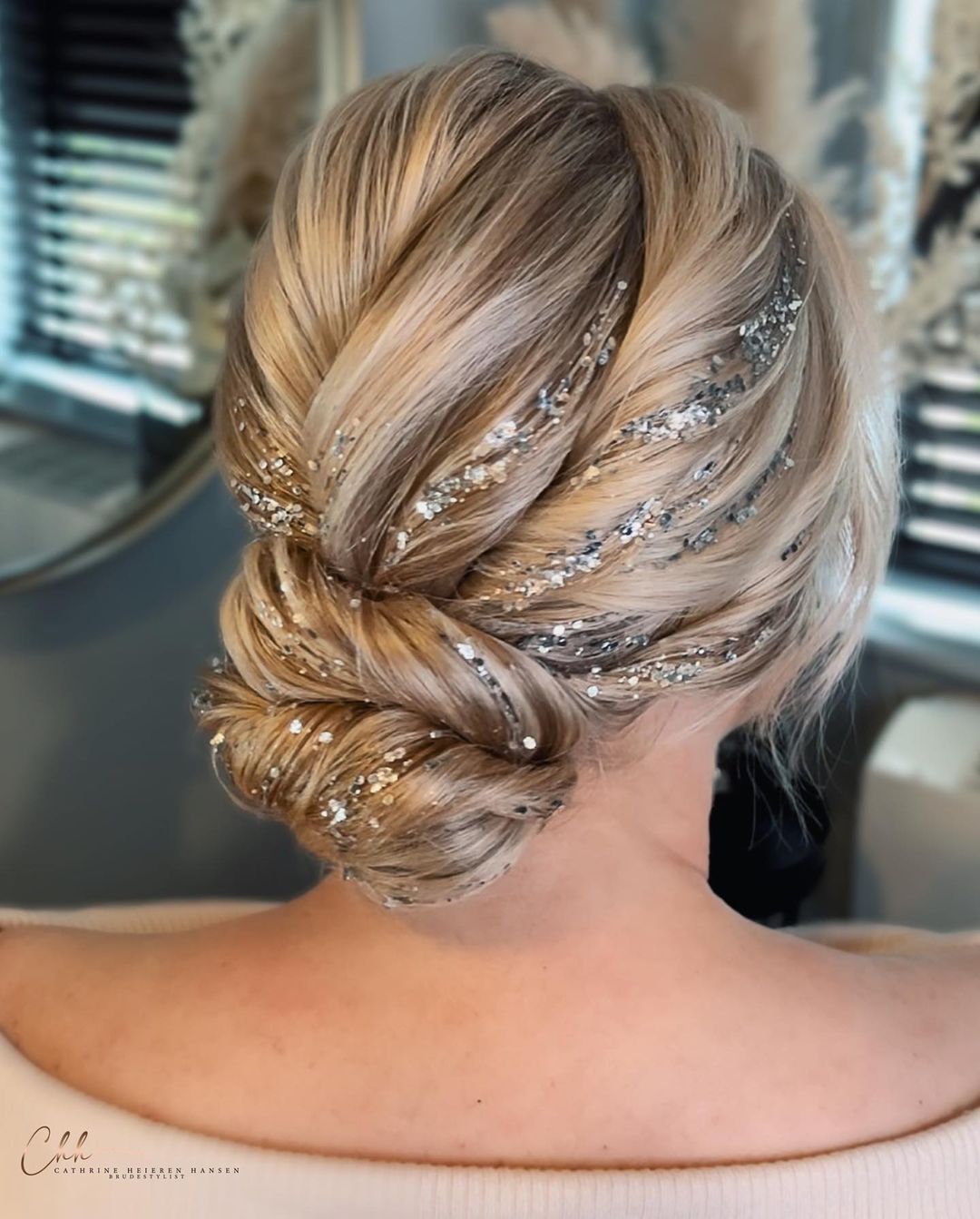 sequined chic updo hairstyle for maid of honor via cathrineheierenhansen