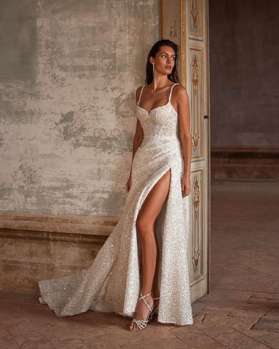sexy beaded fit and flare wedding dress with high slit via millanova