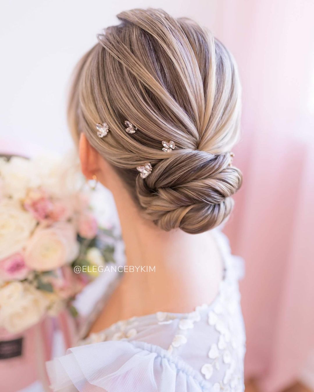 simple elegant bridesmaid updo with hairpieces via elegancebykim