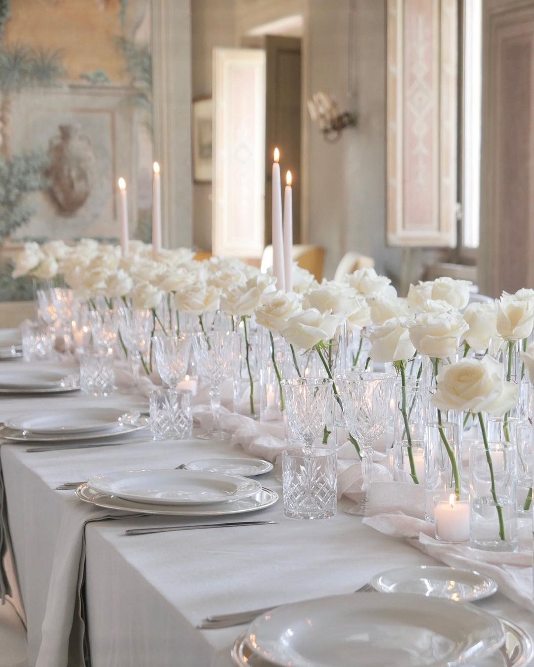 simple white roses wedding centerpiece via flowersliving