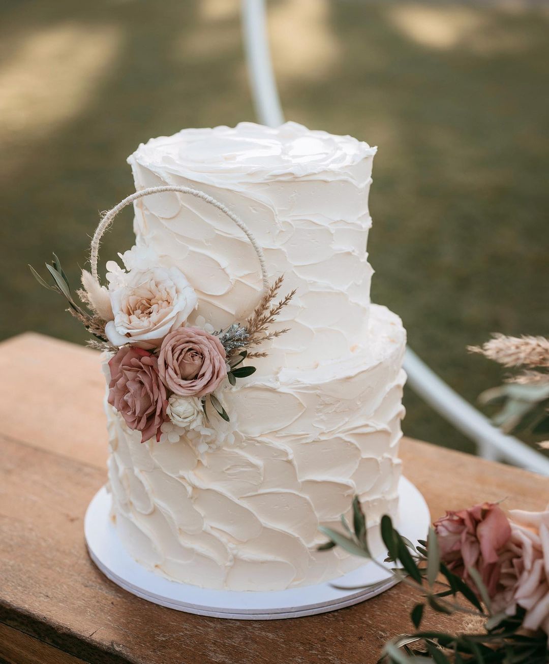 texture butter cream 2 tier bohe wedding cake with mauve roses via milkandhoney.cakecreative