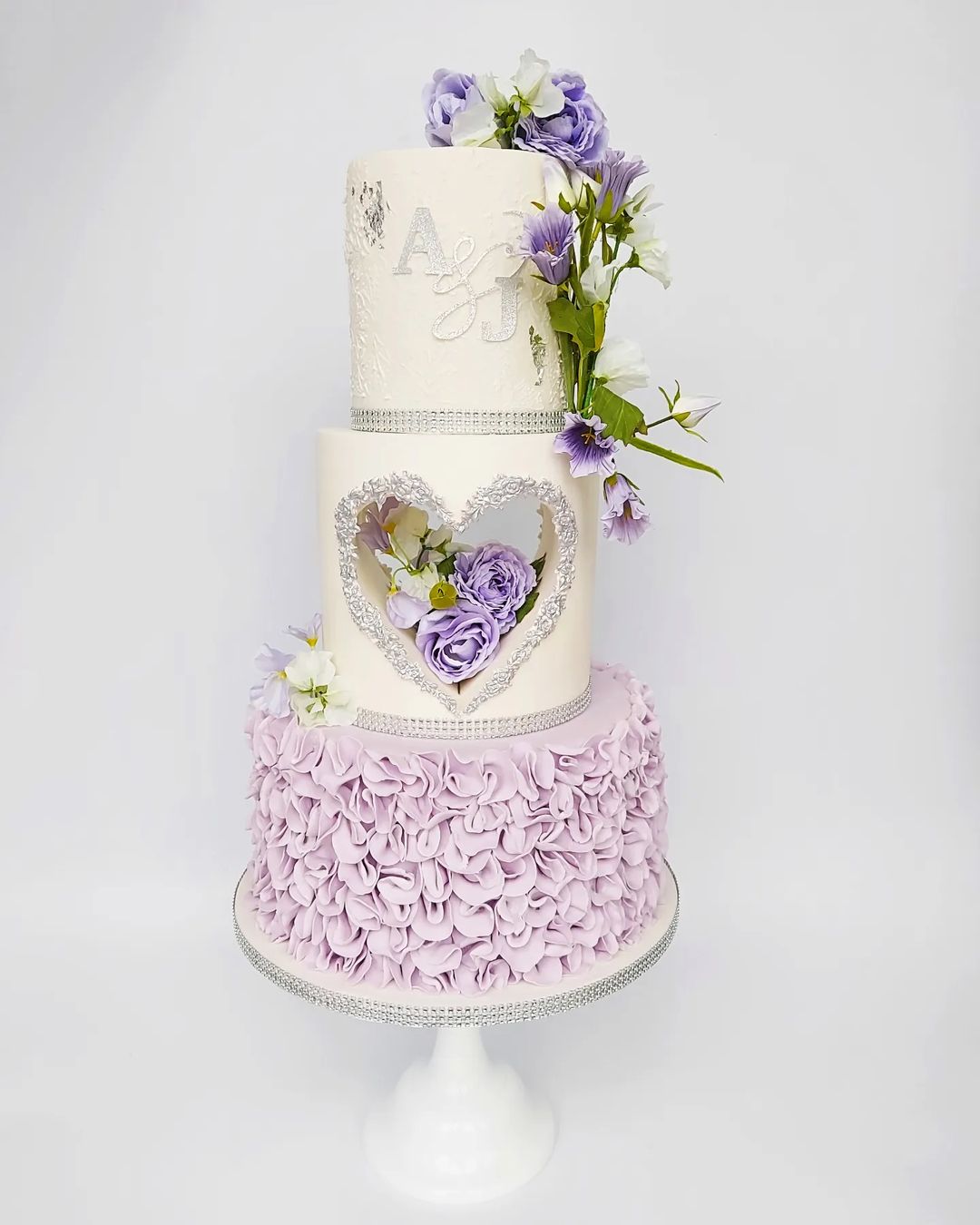 vintage 3 tier lavender purple wedding cake with ruffles via zmweddingcakes