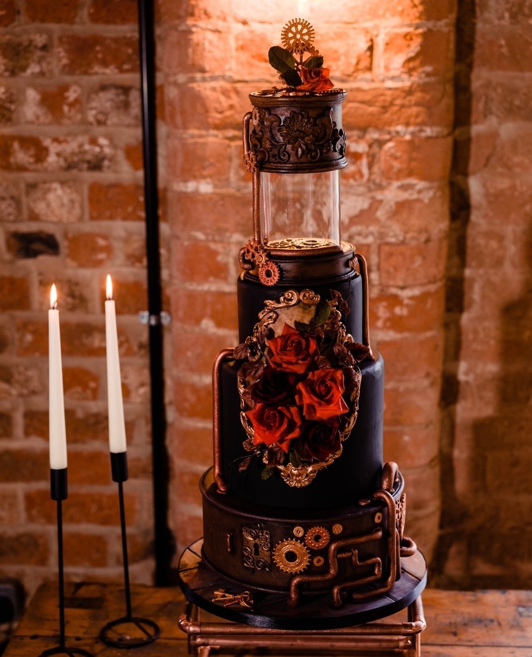 vintage black and red steampunk 4 tier wedding cake