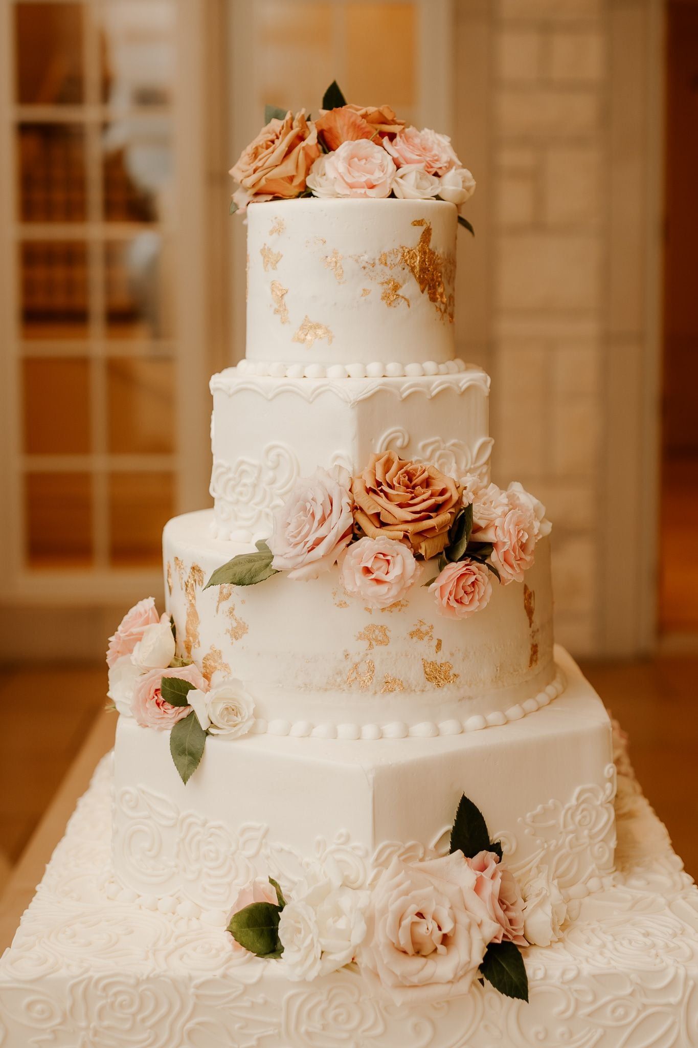 vintage elegant two tier wedding cake with peach roses