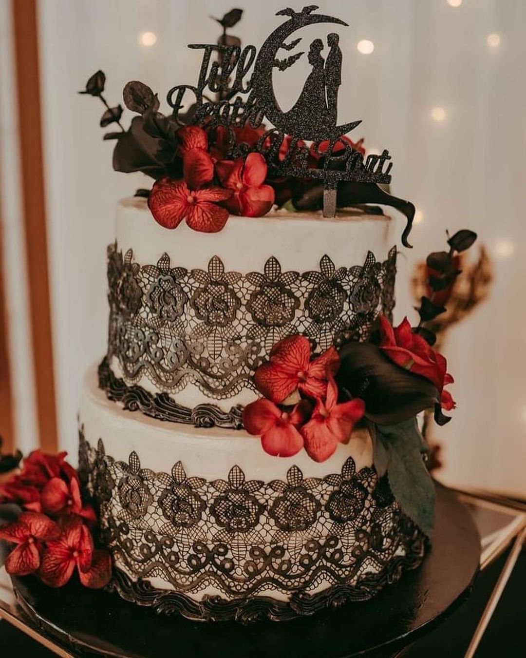 white and black lace wedding cake with red flowers via ashleylynnnxo