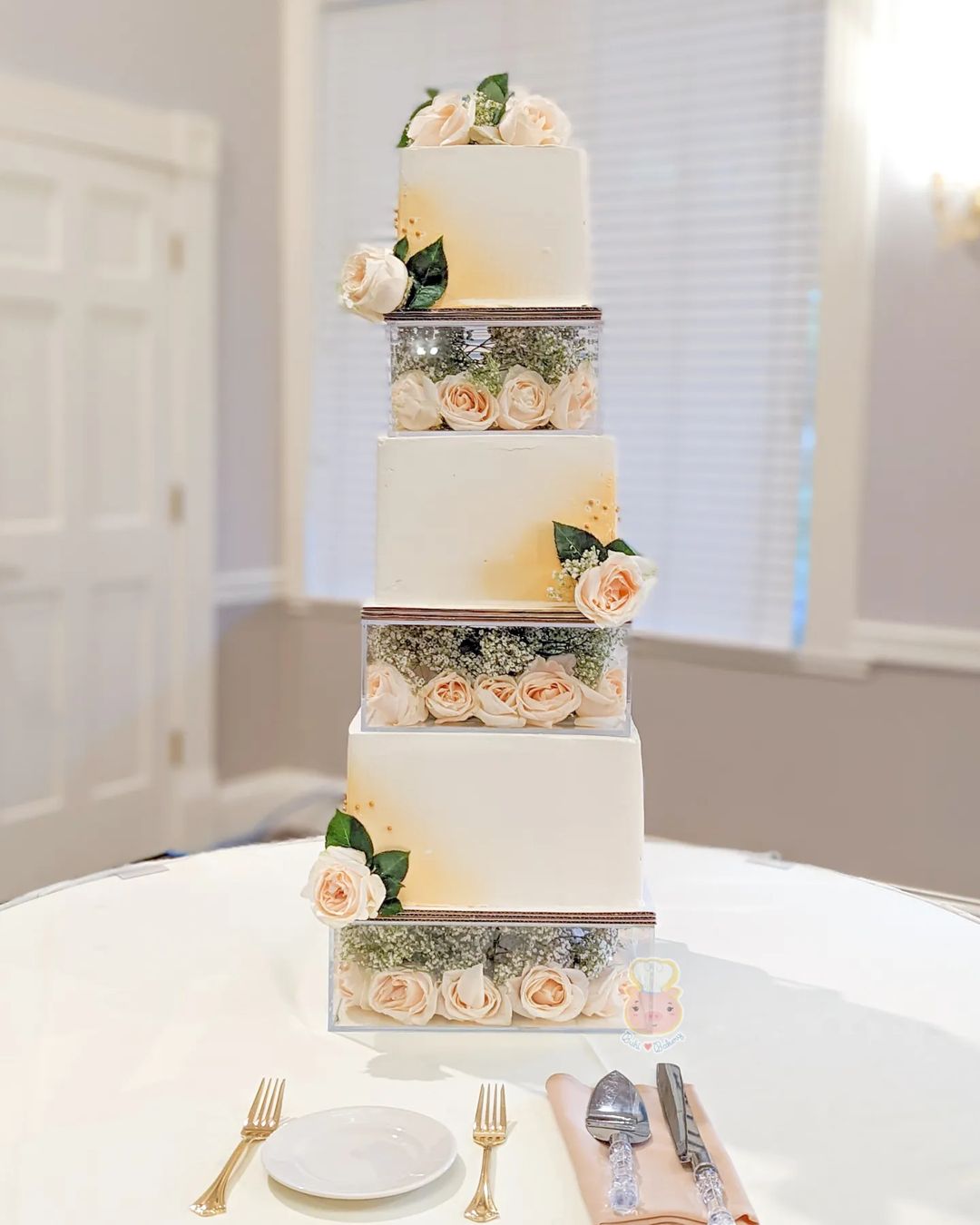 3 tier square wedding cake with peach roses via buhibakery
