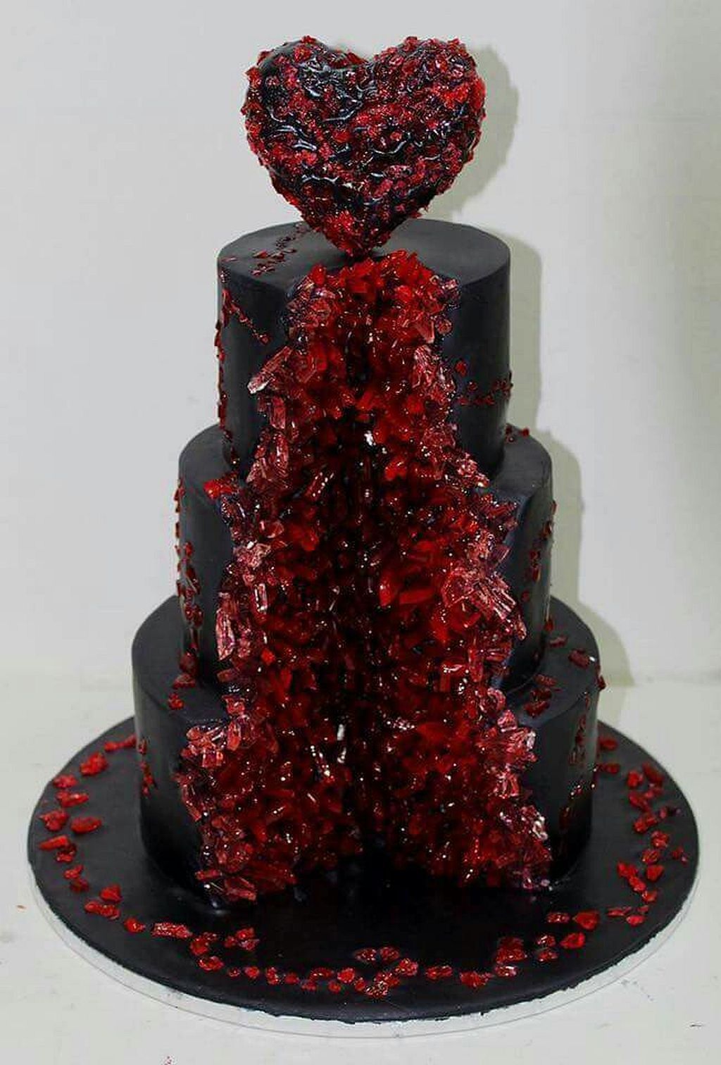 4 tier black and red halloween wedding cake