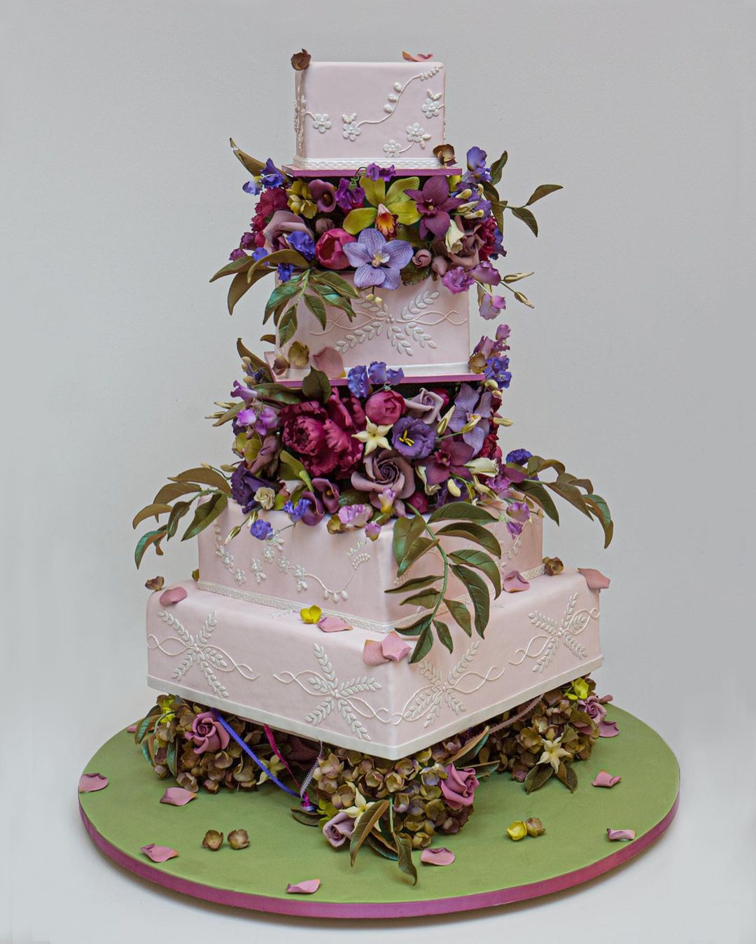 4 tier lavender square wedding cake with purple flowers via rbicakes