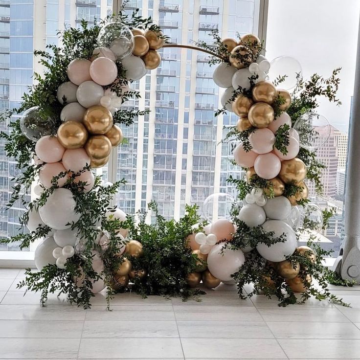 Green Leaves Golden And White Garden Theme Balloon Arch Idea