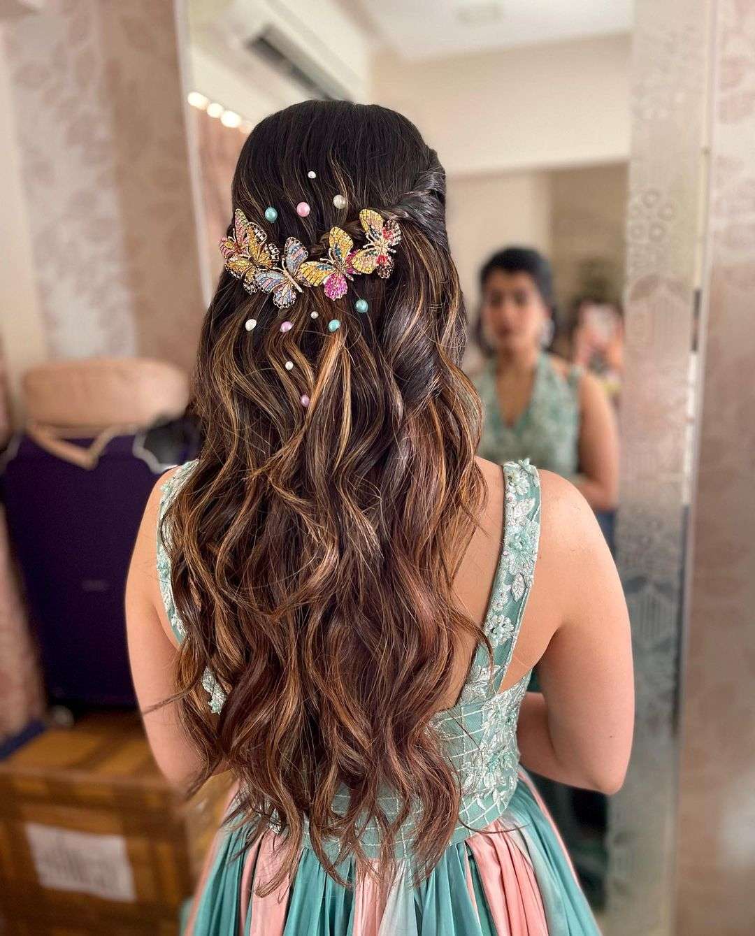 Multi Butterflies and pearls for colourful Mehndi hair indian wedding hairstyle
