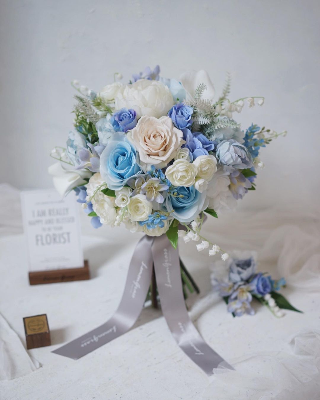 blue roses silk flower wedding bouquet