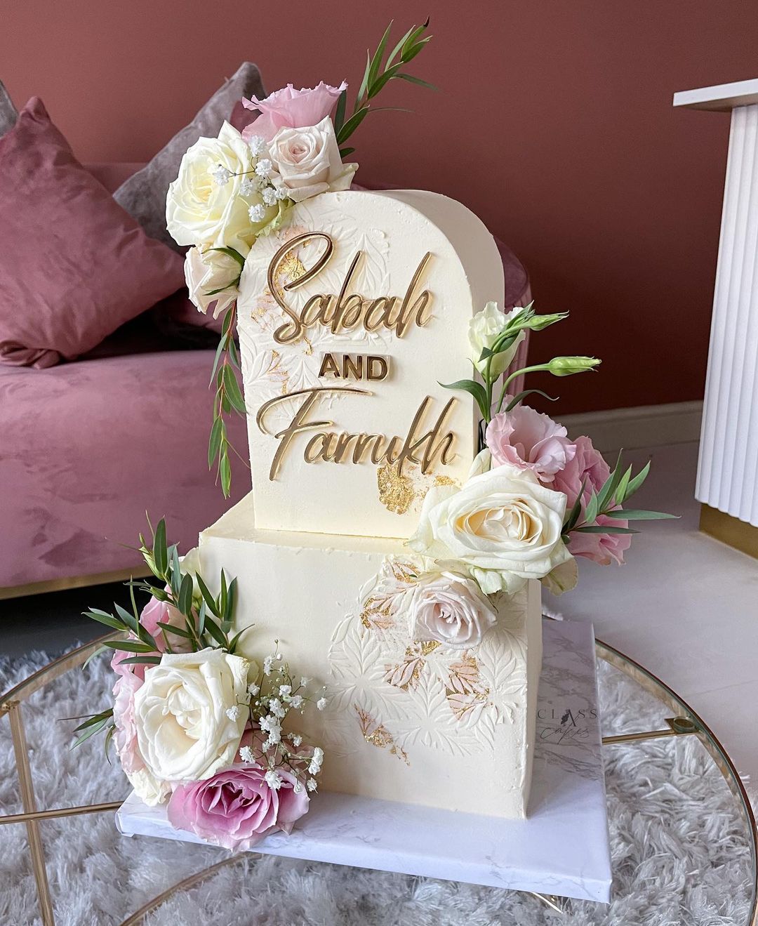 bohemian square wedding cake with arch shape cake and laser cut mirror name sign via classacakes