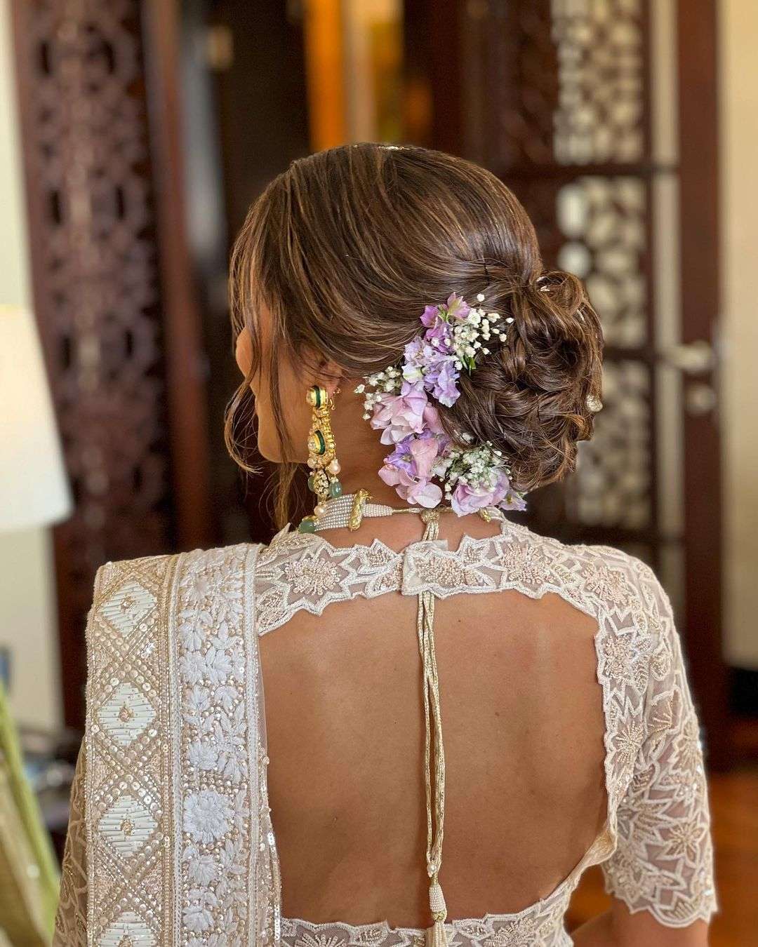 Floral bun hairstyle Inspo for brides or their family ( mother's, sisters  and cousins ) | Bridal hair buns, Low bun wedding hair, Bridal bun