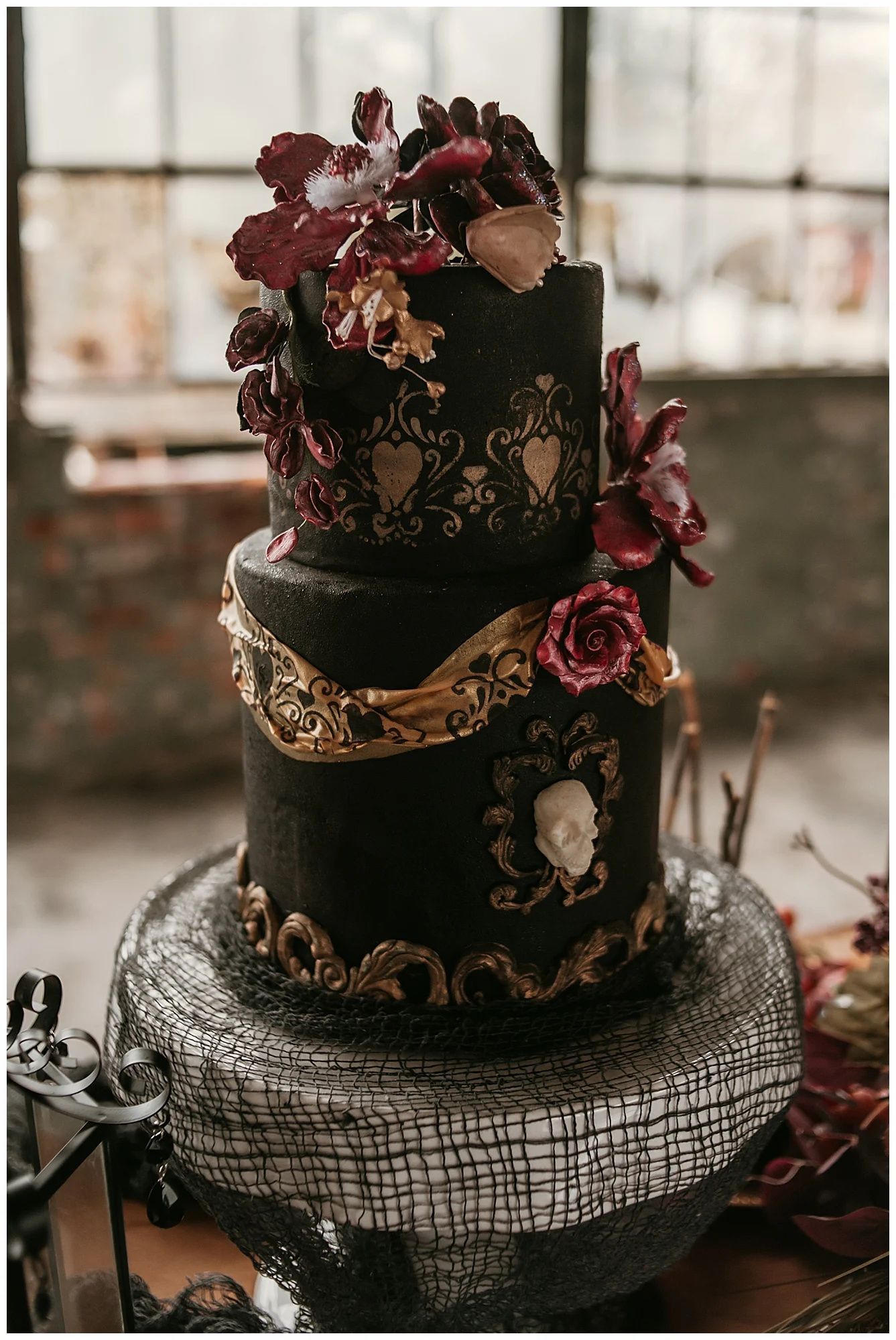 gold and red 'Til Death' halloween wedding cake