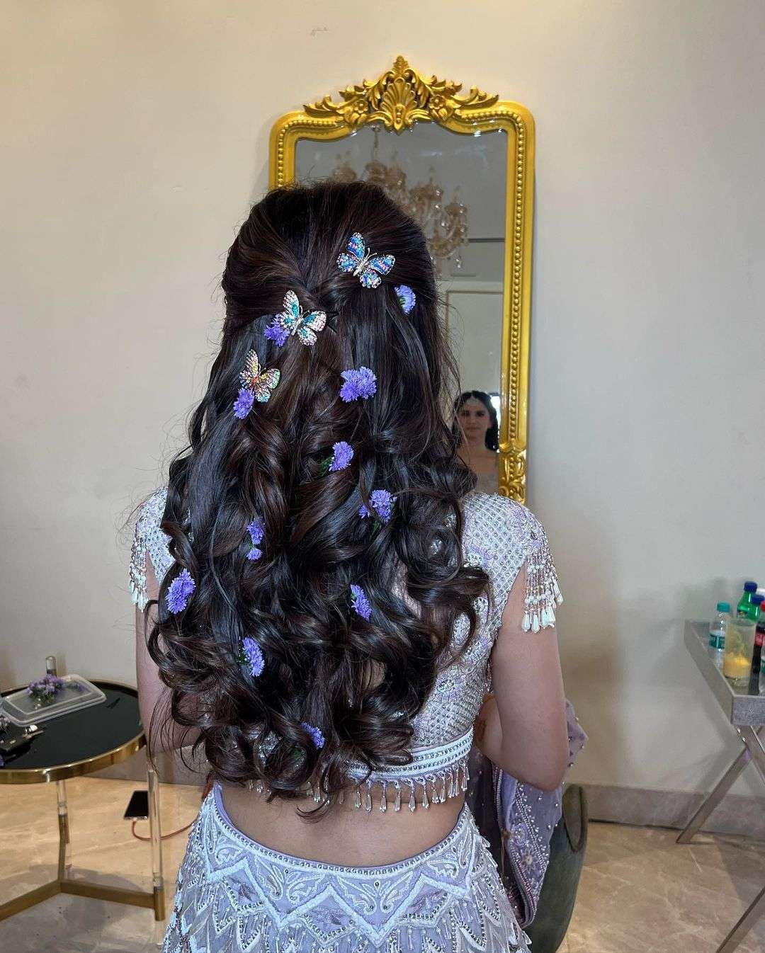 half up half down indian wedding hairstyle with butterfly via amitbhardwaj.hair