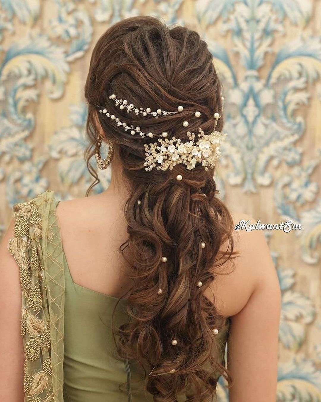 low ponytail indian wedding hairstyle via weddingsdecoded