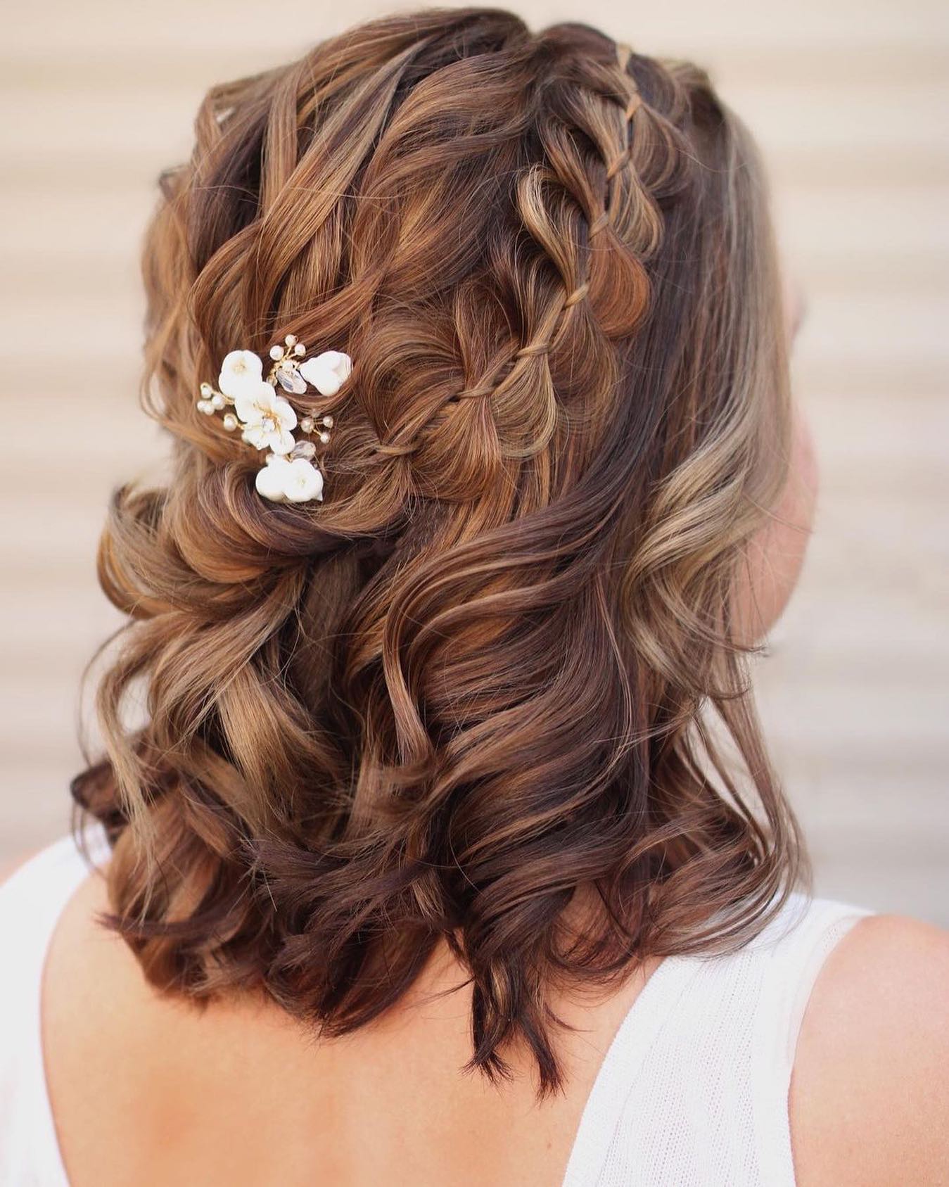 short braided half up half down prom hair style