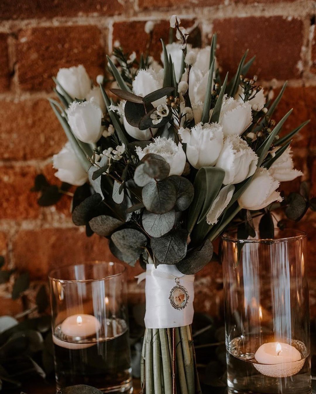 white tulip and eucalyptus rustic wedding bouquet via flowersonmainstreet