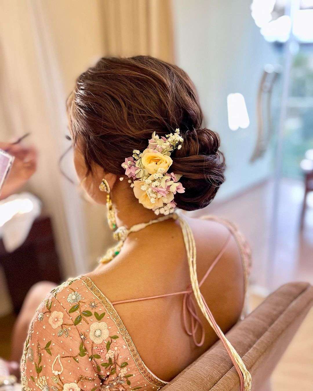 Indian woman bridal hair style attached with jasmine flowers decoration and  neck Stock Photo - Alamy