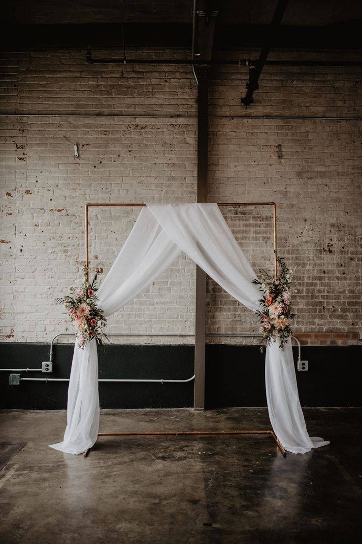 Industrial simple wedding arch