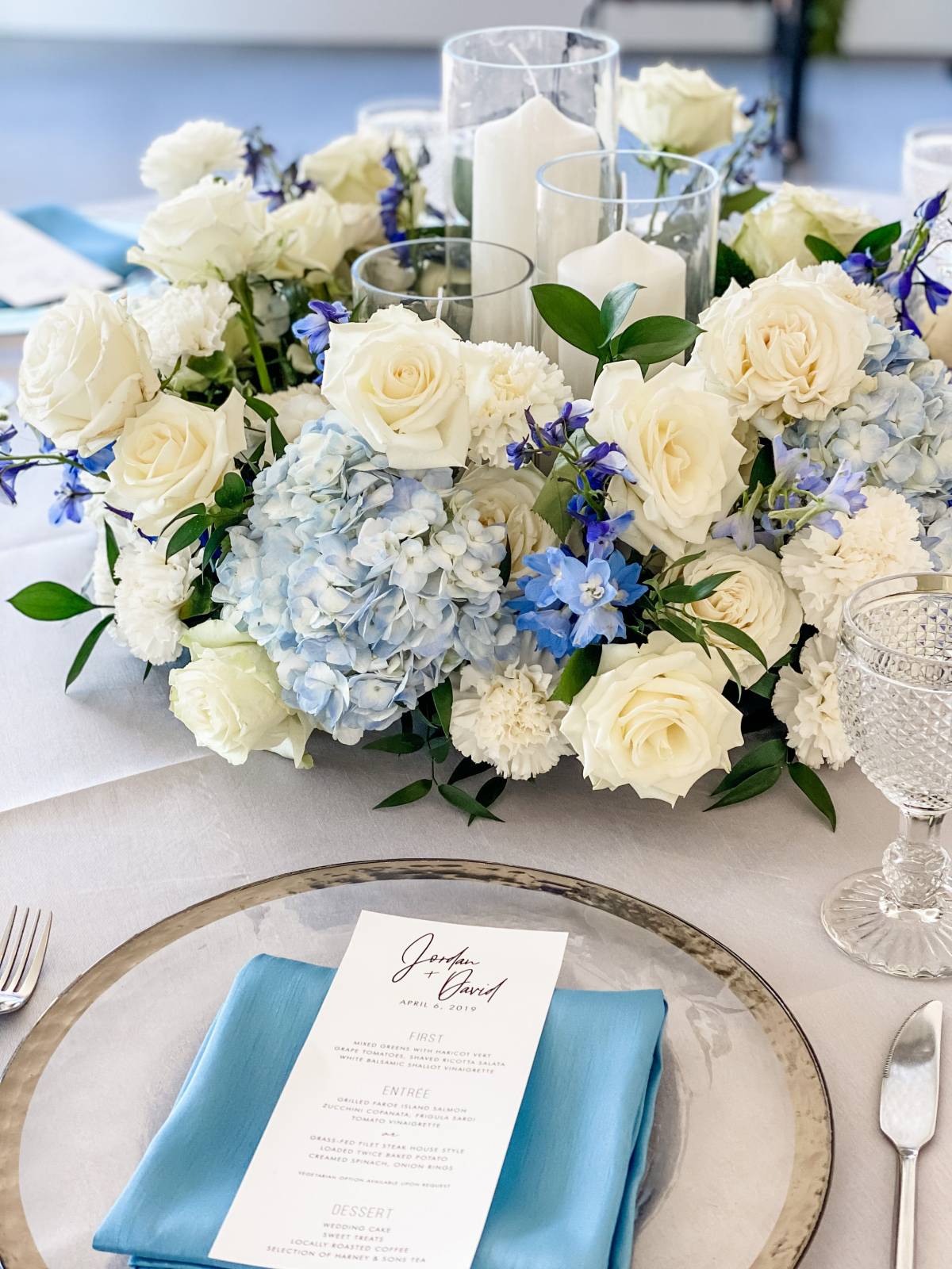 Romantic white and blue flower wedding centerpiece