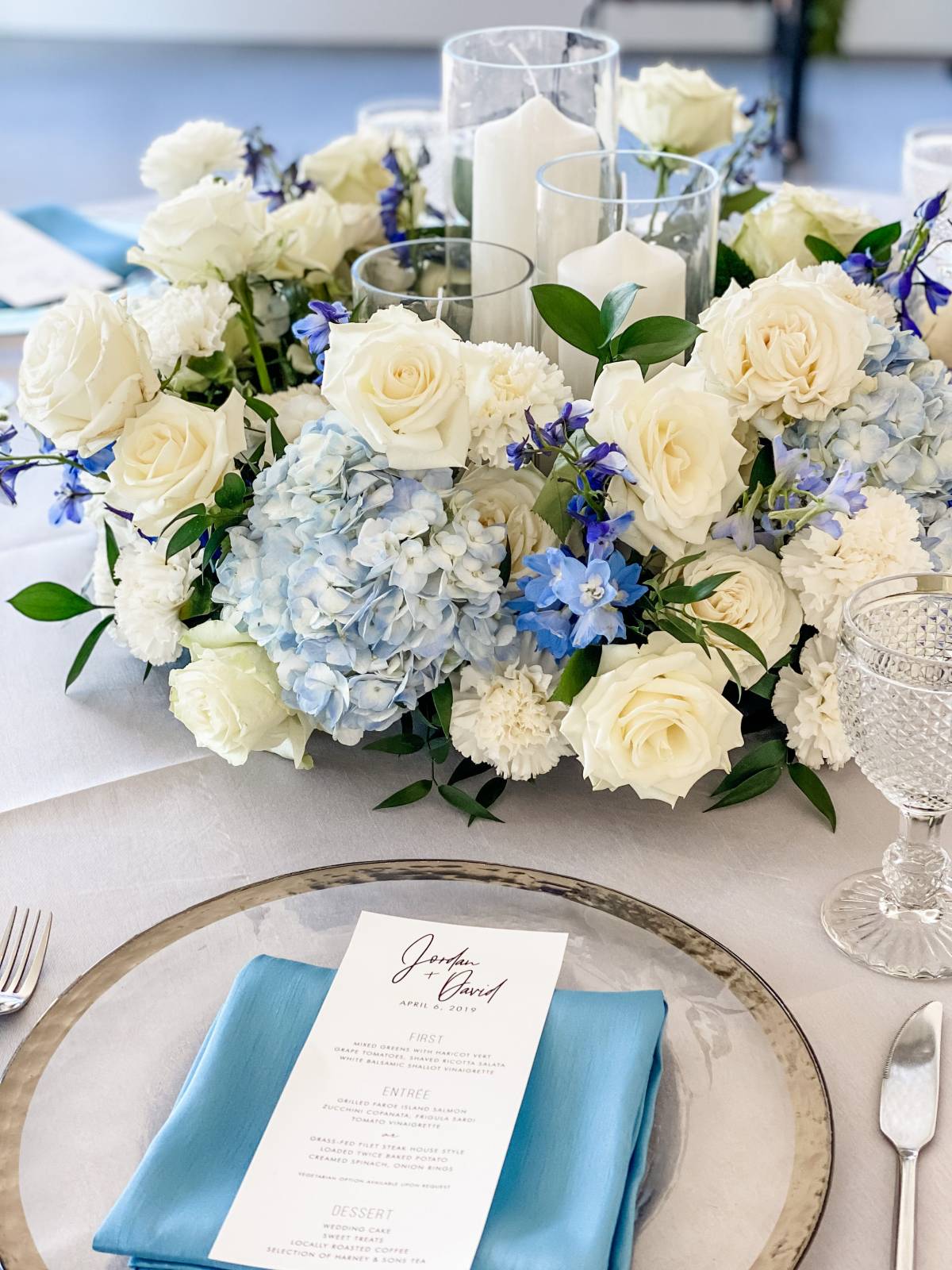 Romantic white and blue flower wedding centerpiece