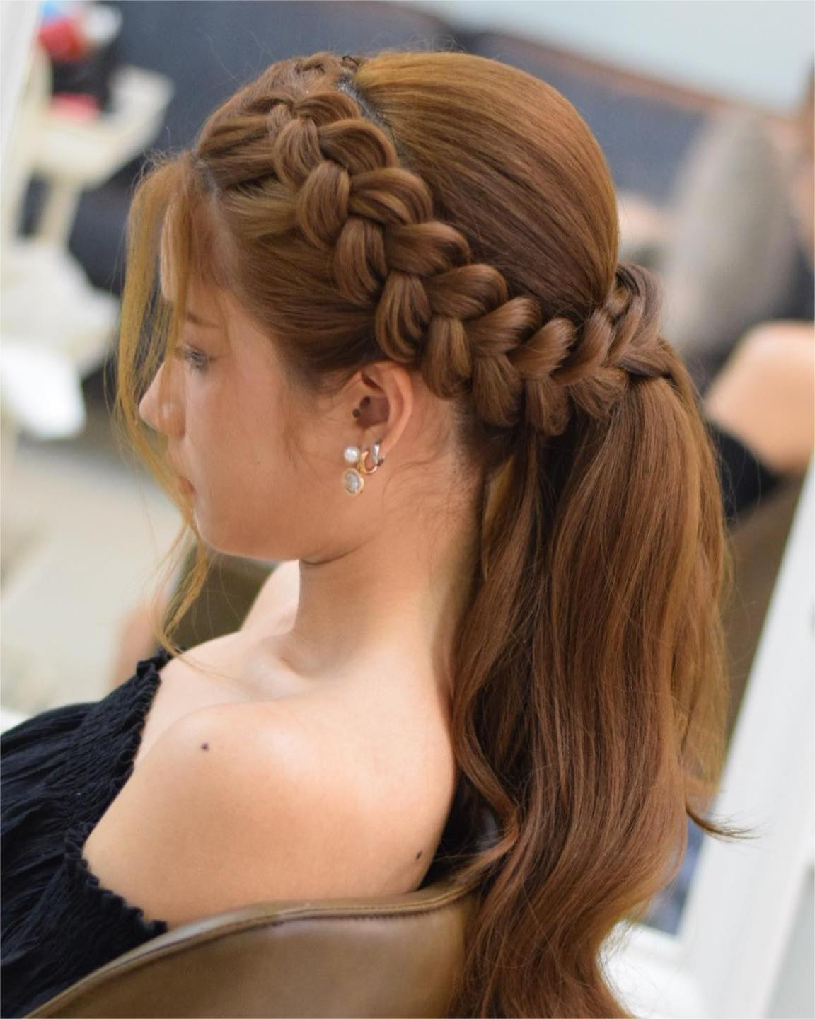 braided half up half down bridesmaid hairstyle front view via nissara_hairstylist_thailand