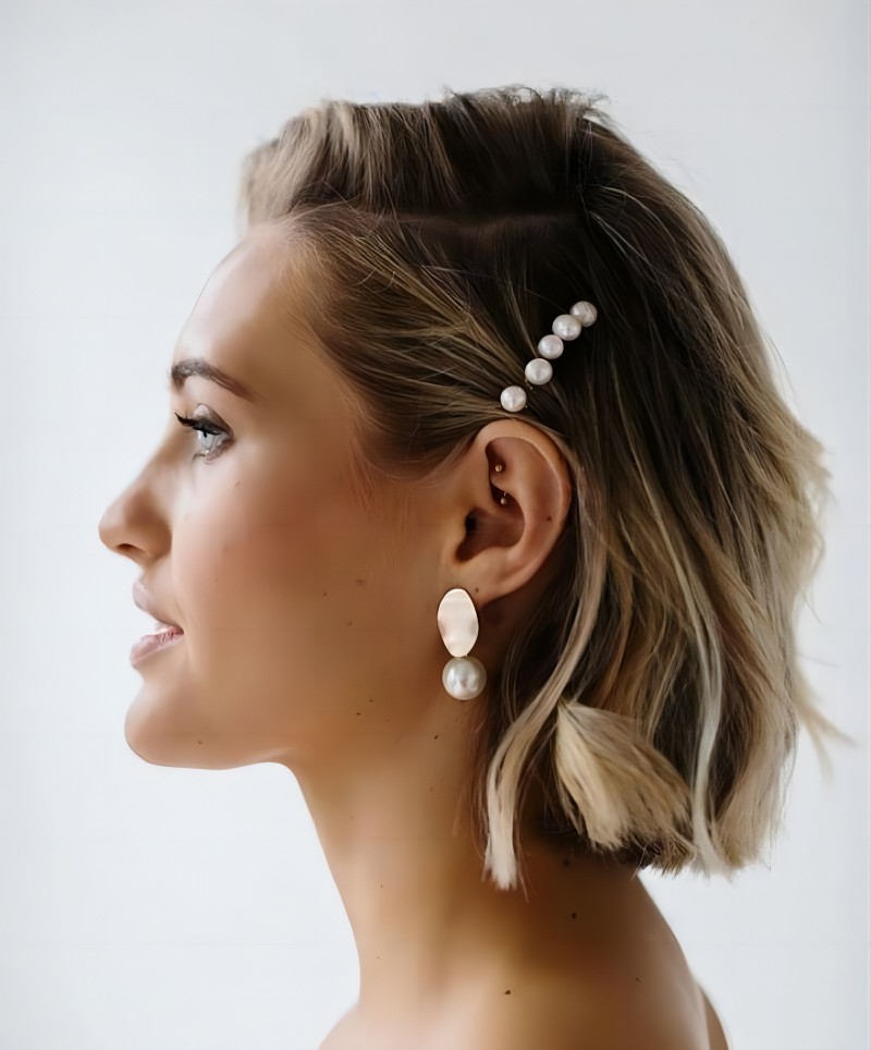 chic boho bridesmaid hairstyle for short hair via allurebridalstylists