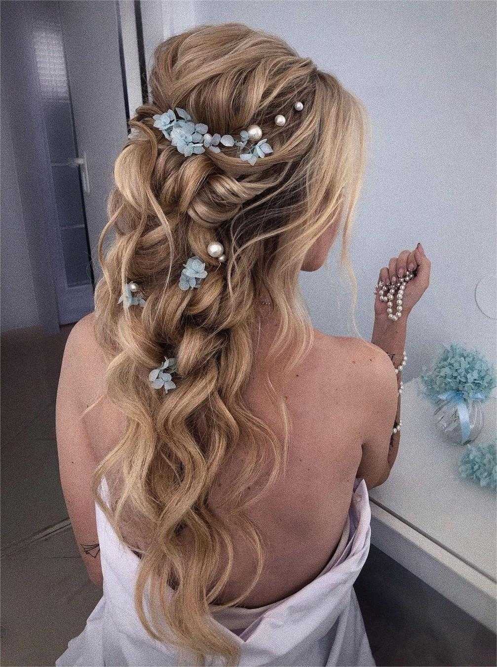 half up curly birthday hairstyle with pearls via zhanna_syniavska