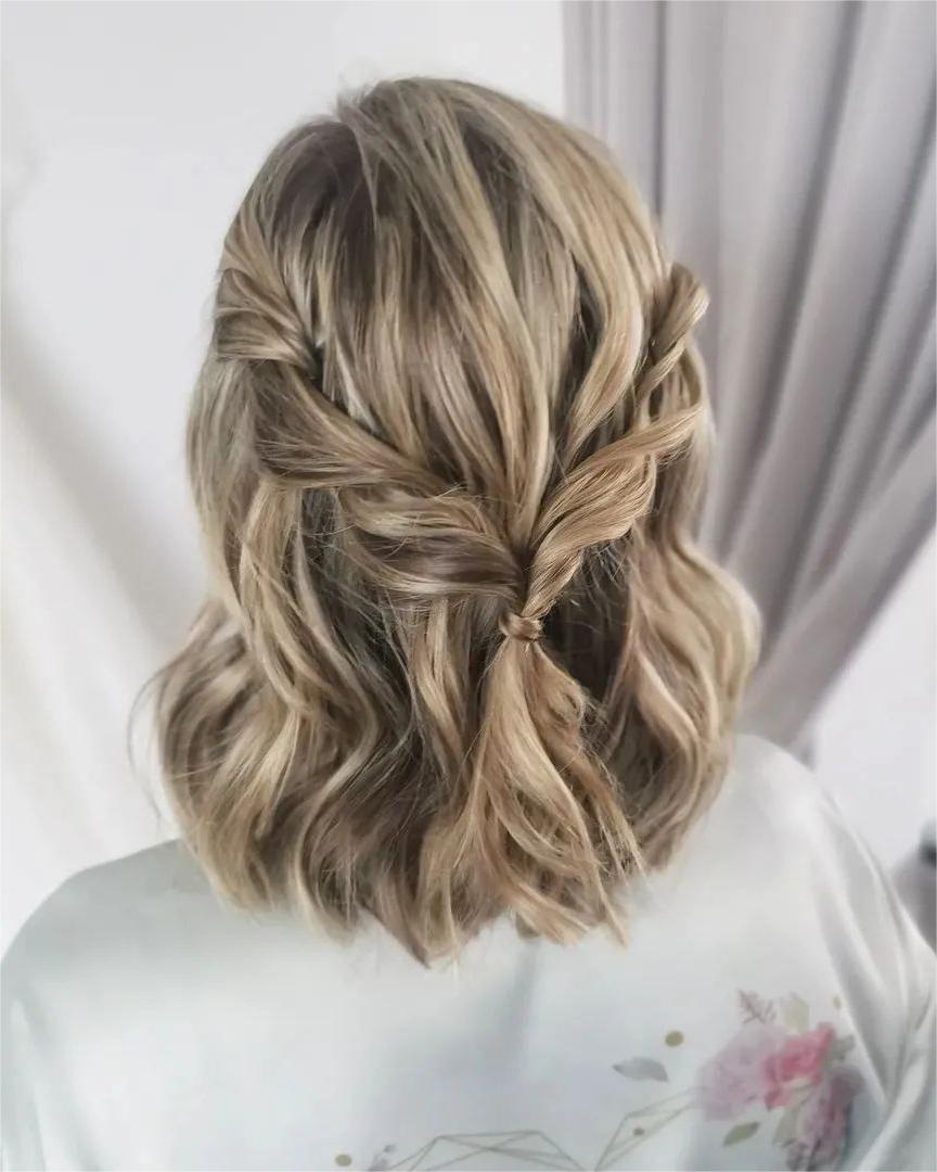 half up half down twist bridesmaid hairstyle for short hair via slacouturehair