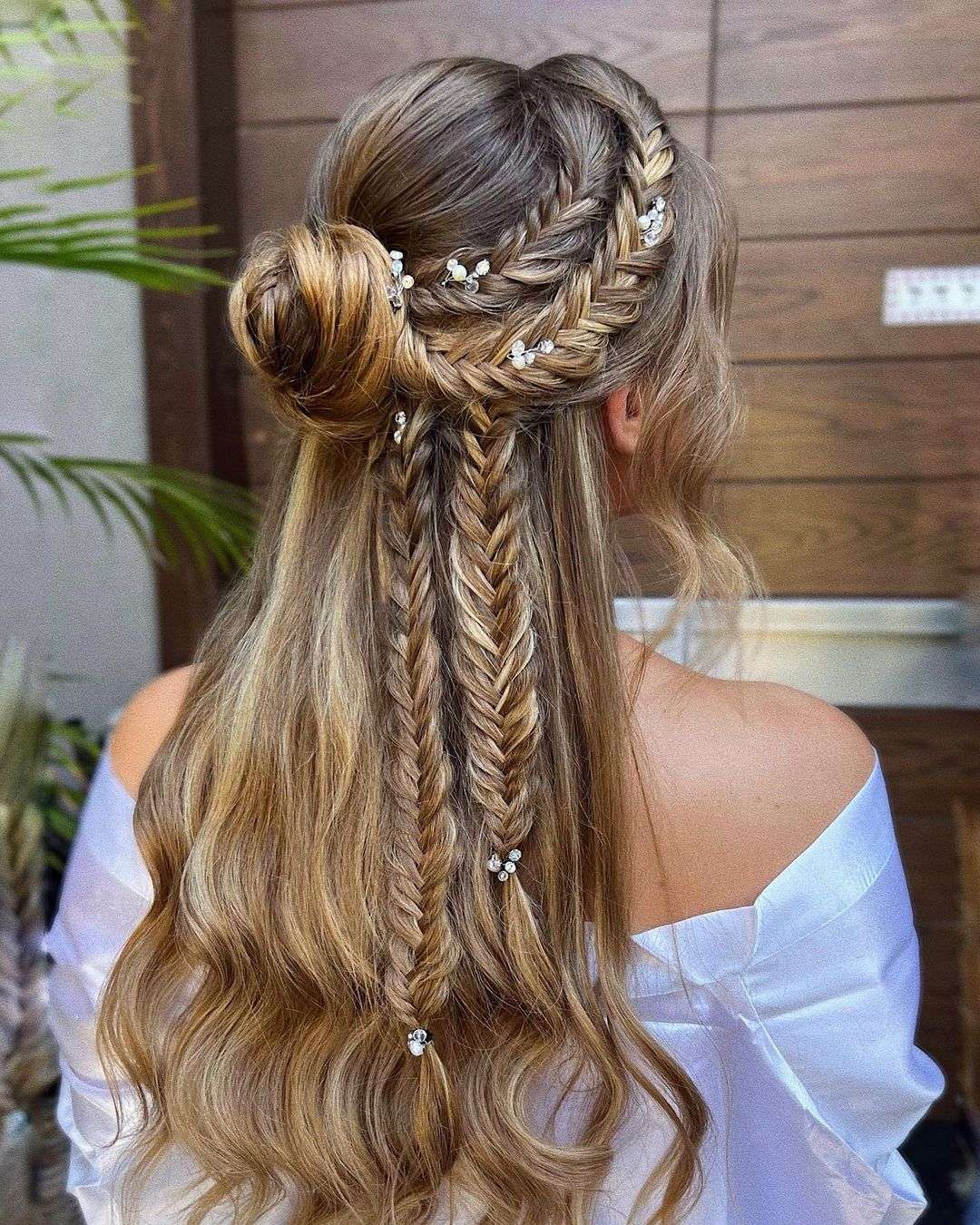 long bohemian braided and high bun hairstyle via zhanna_syniavska