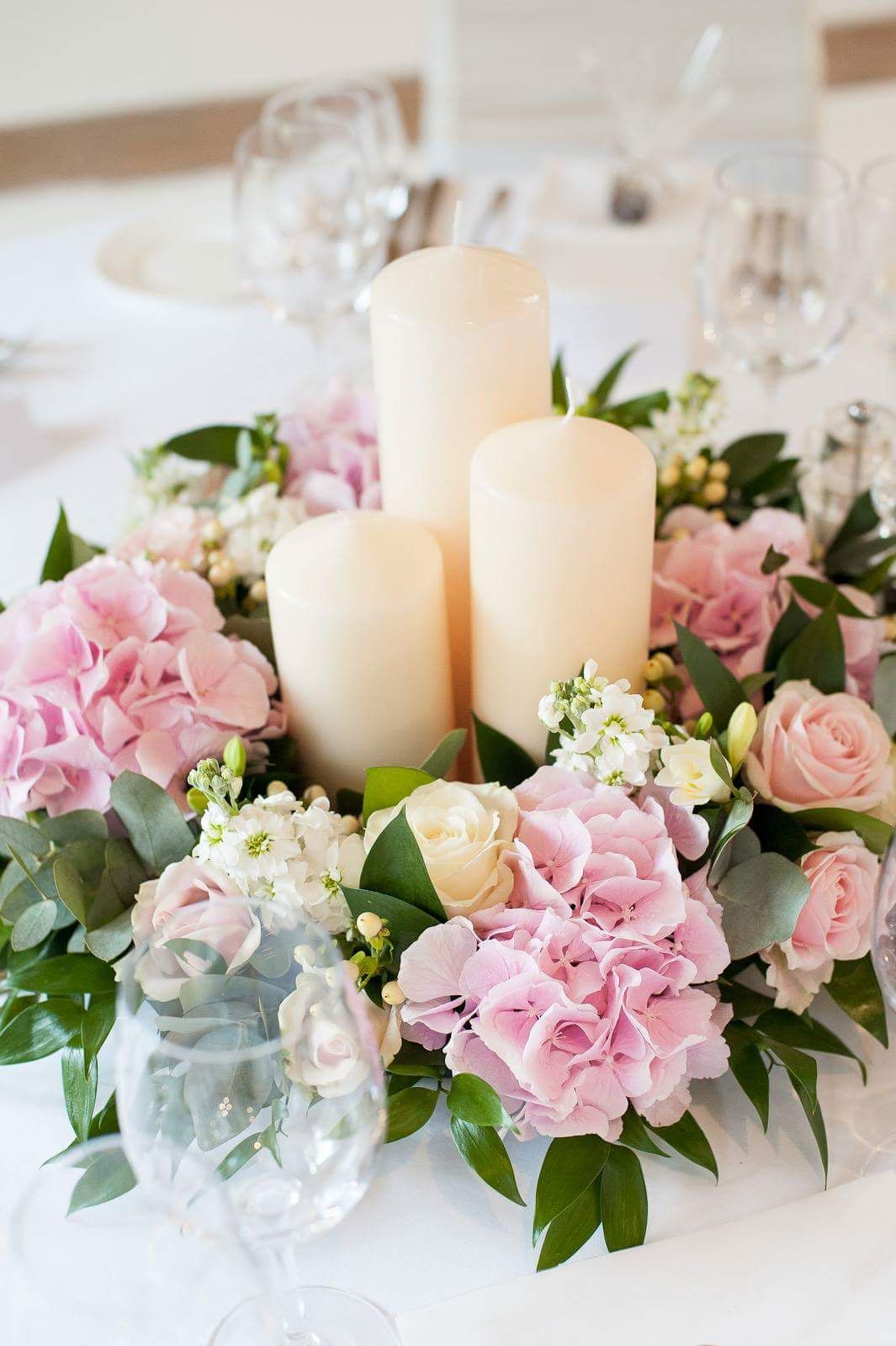 pink hydrangeas and candle wedding centerpieces
