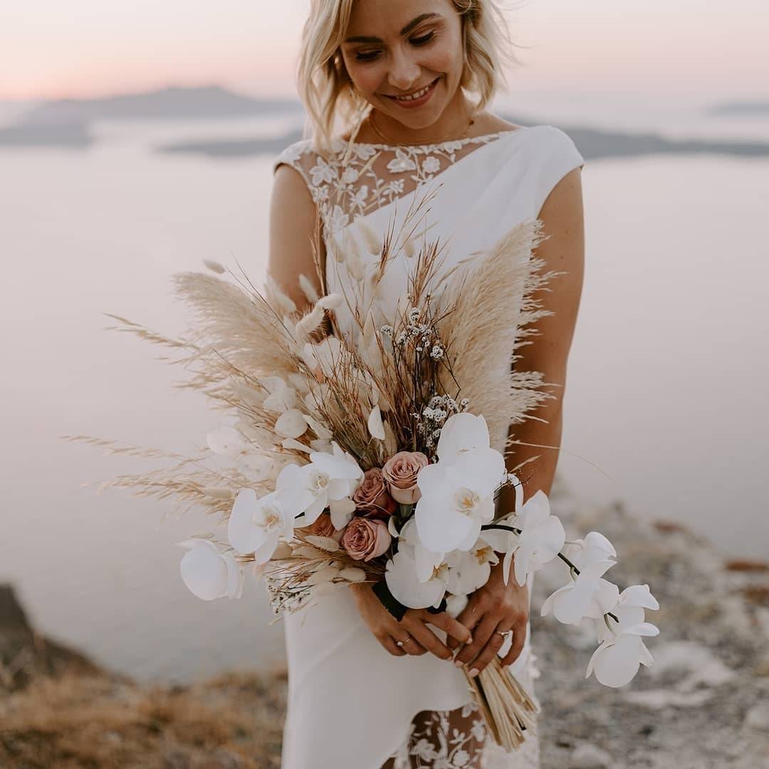 rustic bohemian orchids and pampas grass wedding bouquet