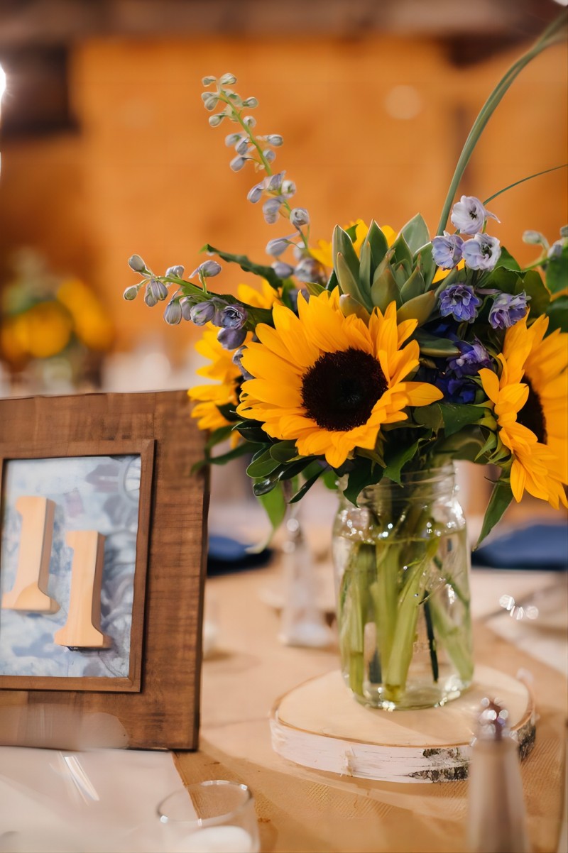rustic sunflowers and mason jar wedding centerpiece