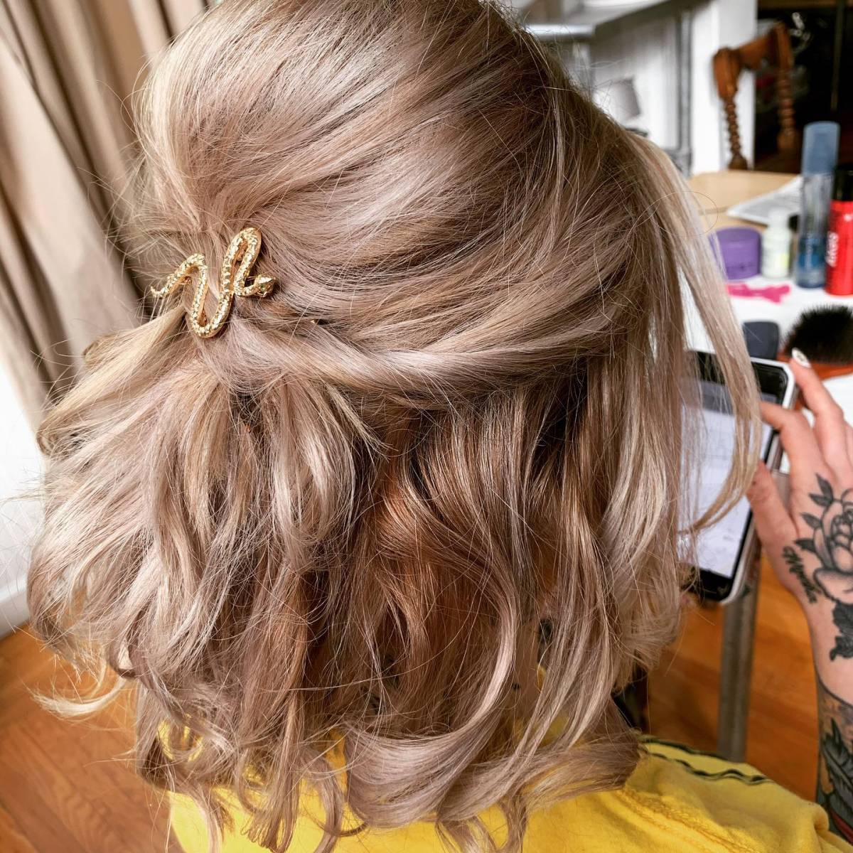 short boho bridesmaid hairstyle via stellakimartistry