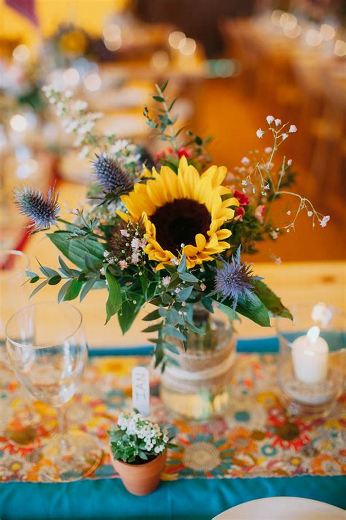 sunflowers and mason jar with burlap wedding centerpiece