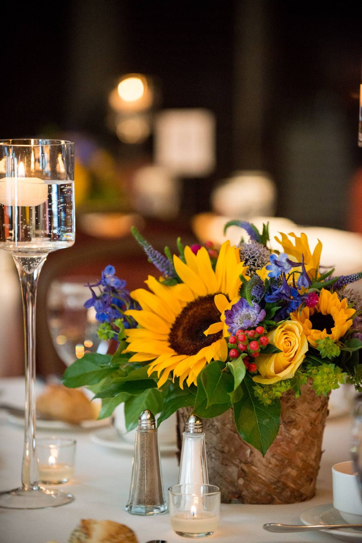 sunflowers and tree vase wedding centerpiece