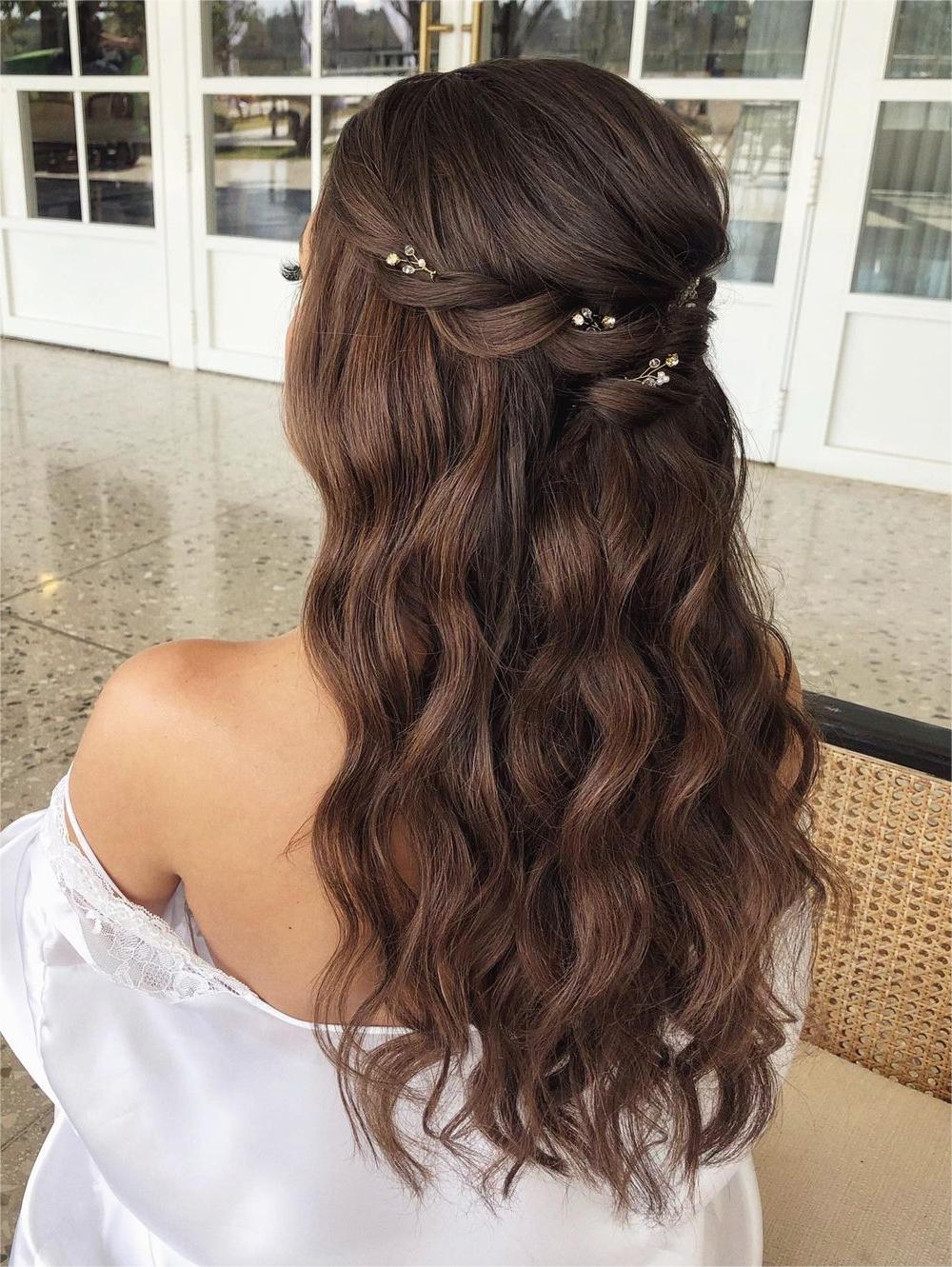 twist waterfall half up half down bridesmaid hairstyle via zhanna_syniavsk