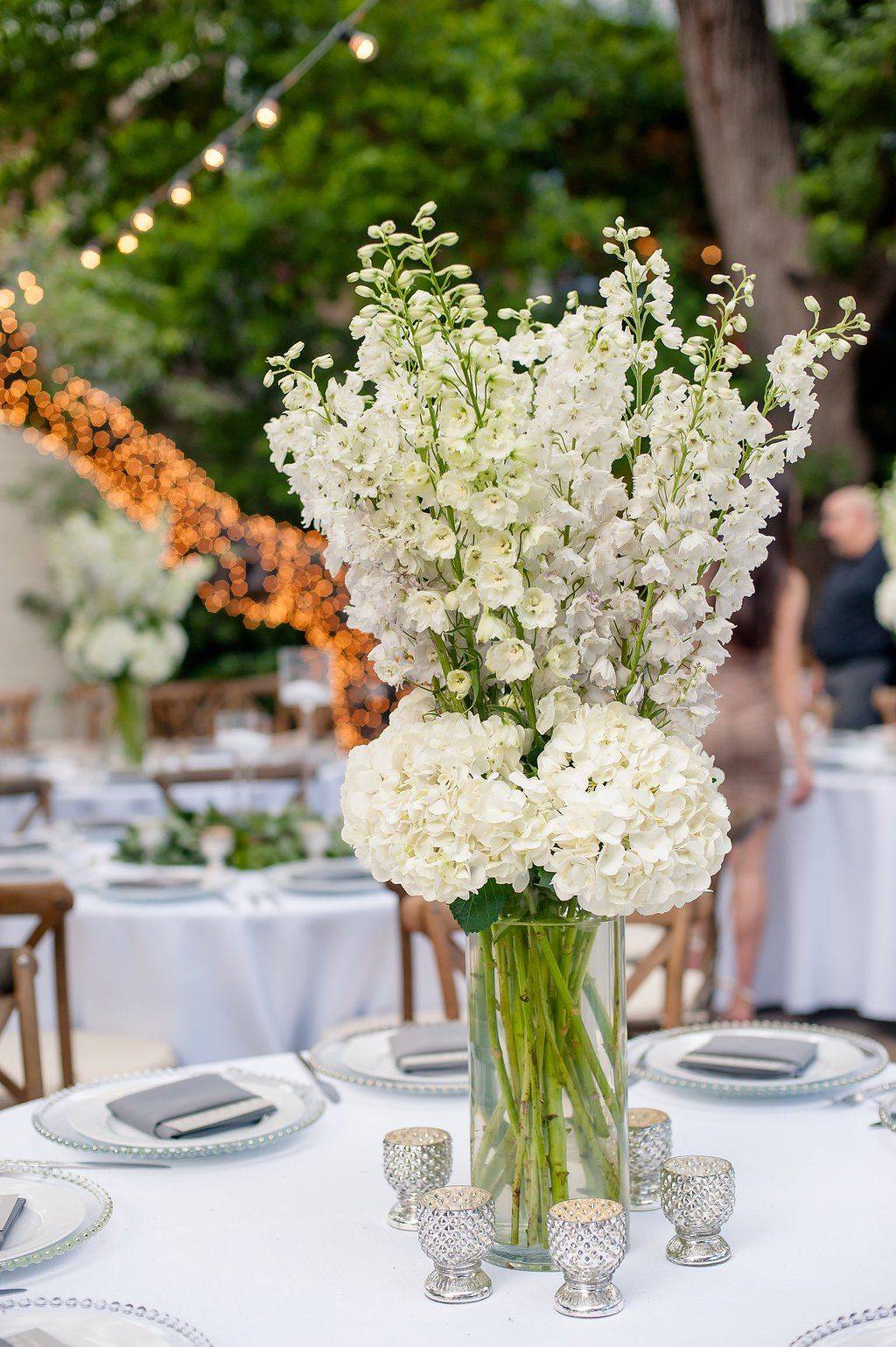 white delphinium and hydrangea tall wedding centerpiece