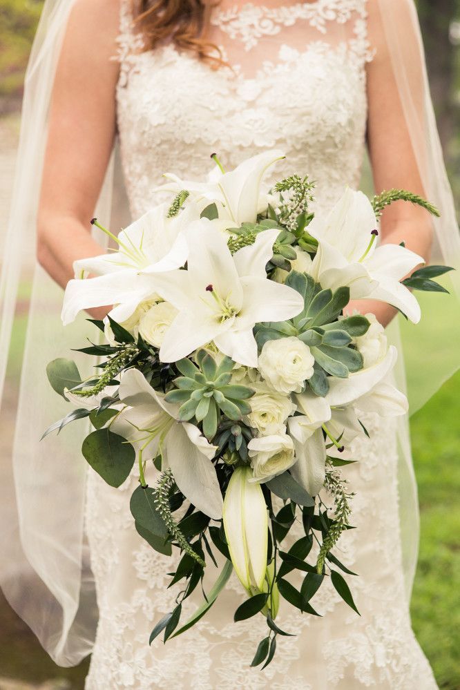 white lily and succulent wedding bouquet
