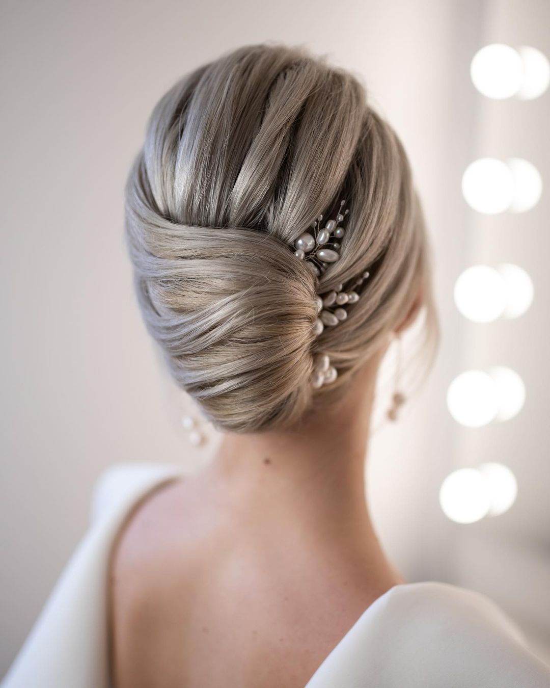 Classic chignon wedding updo via beautybyrockagirl