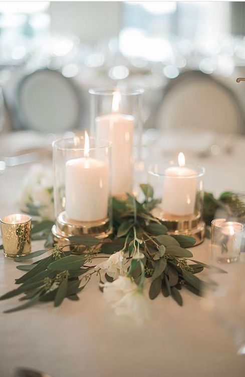 Modern wedding table centrepieces with candles