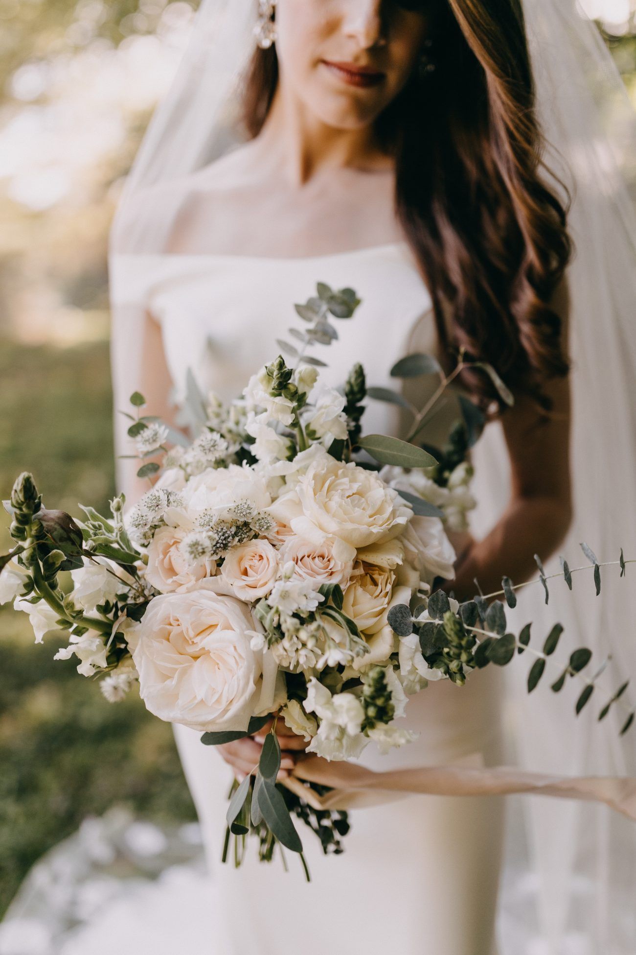Rustic white garden roses and eucalyptus wedding bouquet