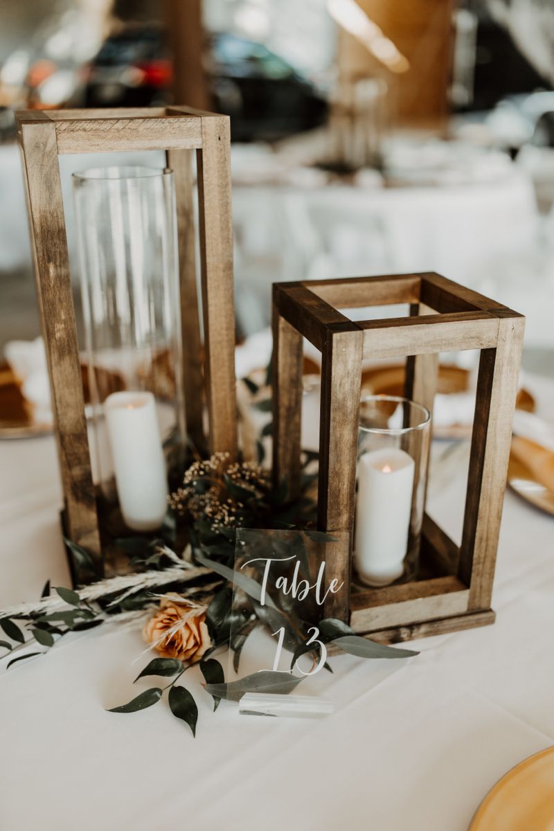 Wood lantern wedding centerpiece